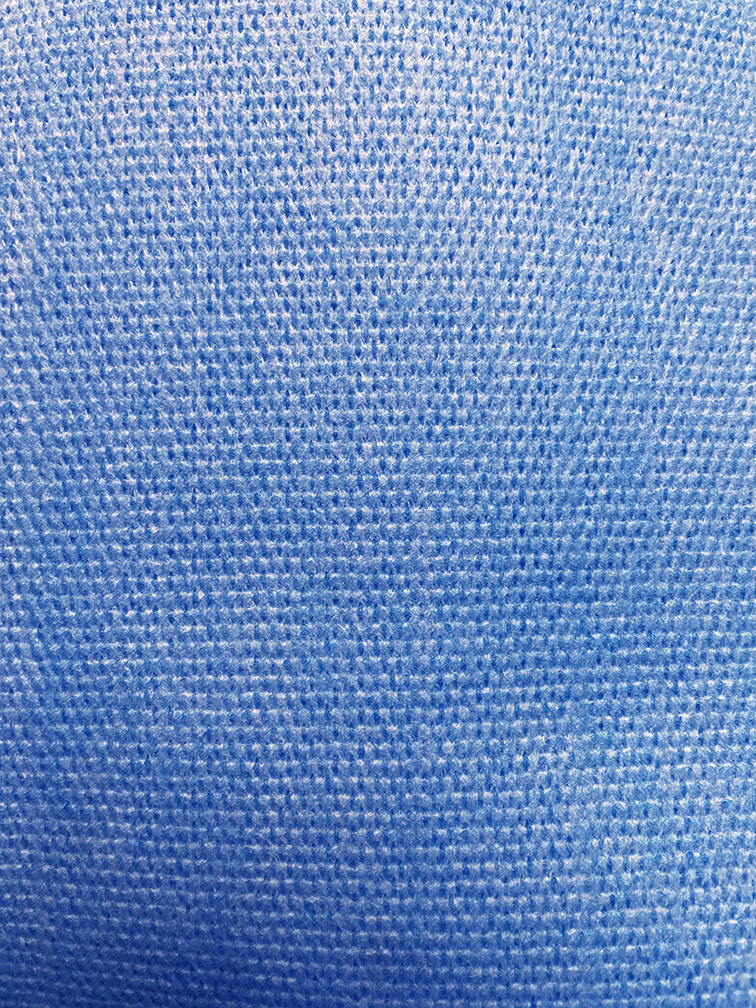 krosstex close up blue Close up photo of blue KrossTex nonwoven material to show texture
